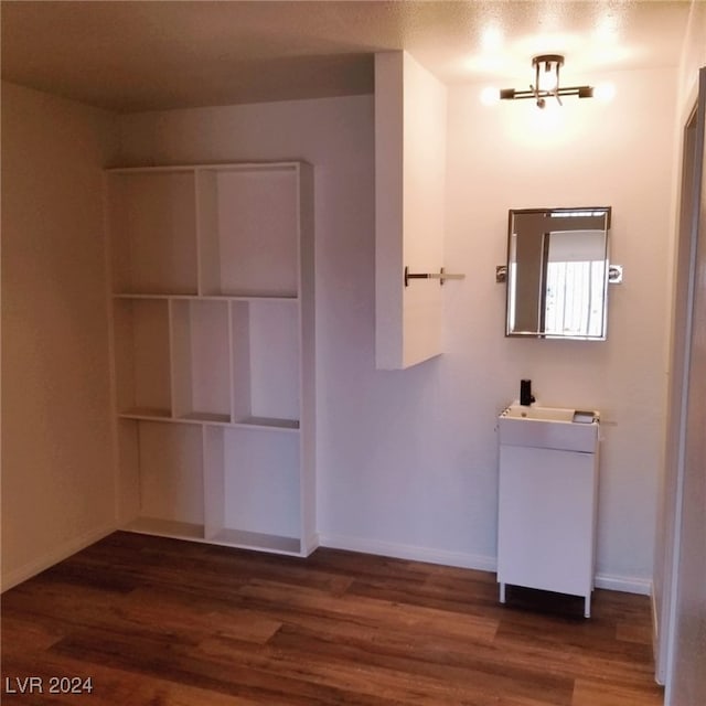 bathroom with wood-type flooring