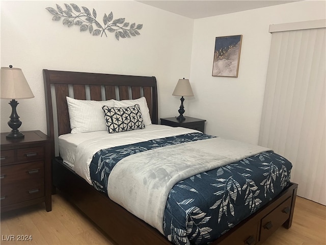 bedroom featuring light hardwood / wood-style flooring