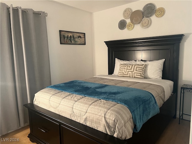 bedroom with light hardwood / wood-style floors