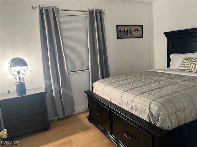 bedroom featuring light wood-type flooring