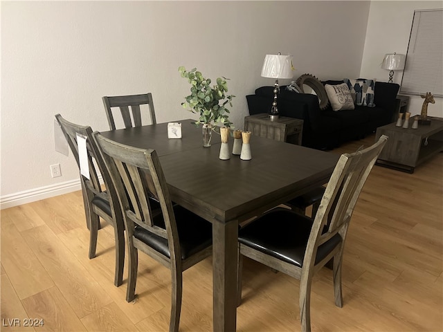 dining room with light hardwood / wood-style floors