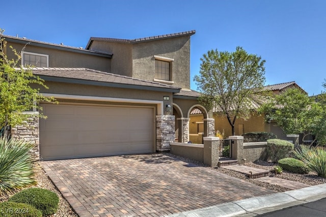 view of front of property featuring a garage