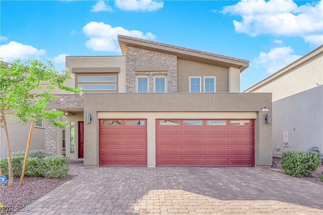 view of front of property with a garage