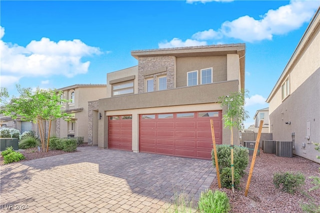 view of front of property featuring a garage