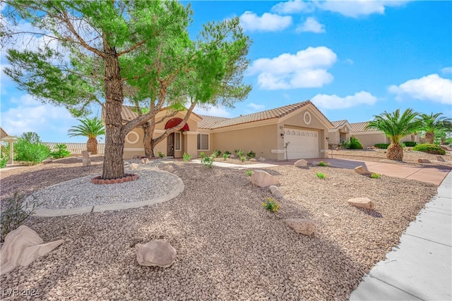 view of front of property featuring a garage