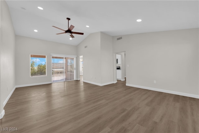 unfurnished living room featuring hardwood / wood-style floors, ceiling fan, and high vaulted ceiling