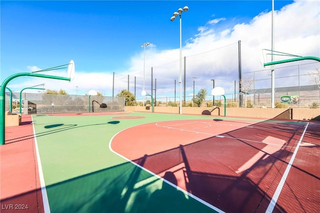 view of sport court with community basketball court and fence