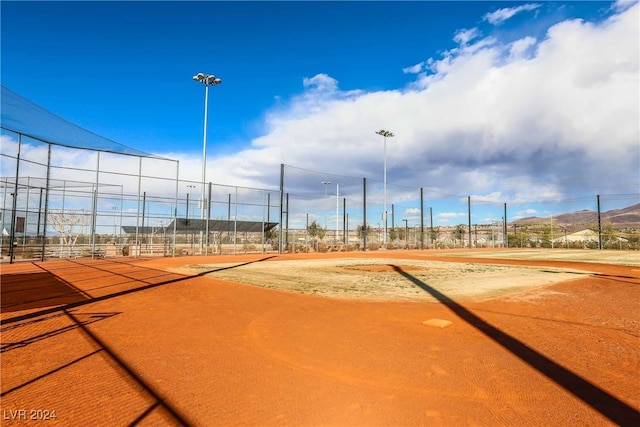 view of community featuring fence