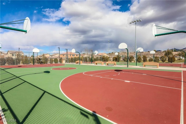 view of sport court featuring community basketball court and fence