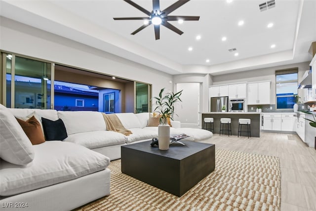 living room with ceiling fan