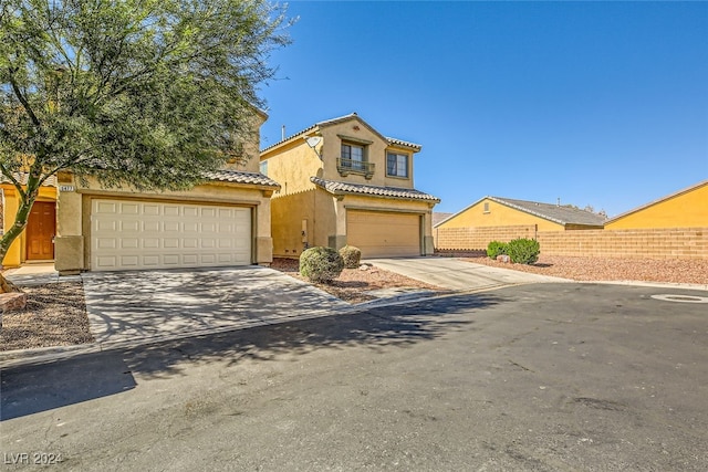 view of front of property with a garage