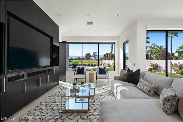 living room with recessed lighting and visible vents