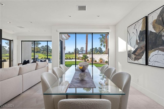 dining space featuring light tile patterned floors, recessed lighting, visible vents, and baseboards