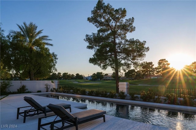 view of pool featuring a fenced in pool, a patio area, and a fenced backyard