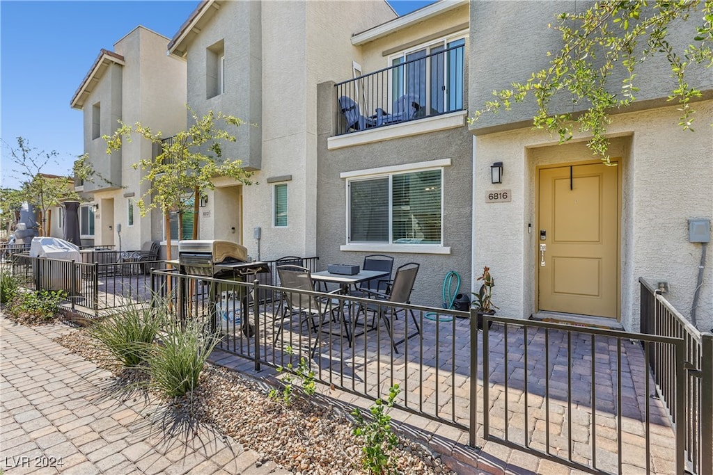 exterior space featuring a balcony