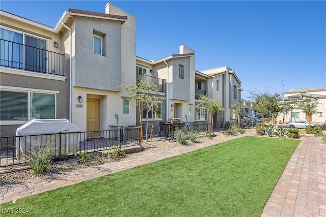 exterior space with a front lawn