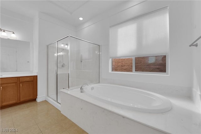 full bath with a garden tub, a stall shower, vanity, and tile patterned flooring