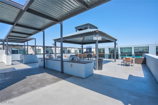 view of patio featuring a grill