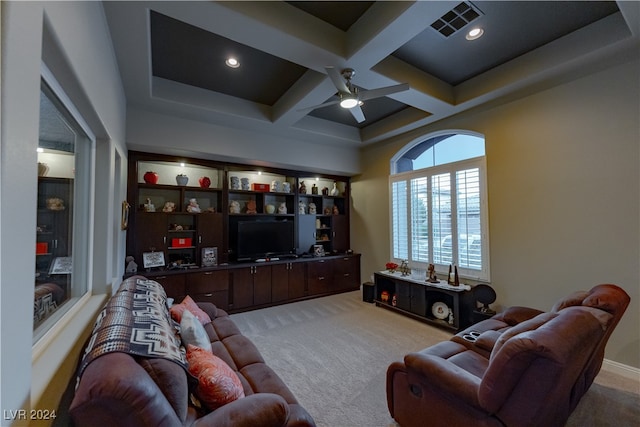 carpeted living room with coffered ceiling, ceiling fan, and beamed ceiling