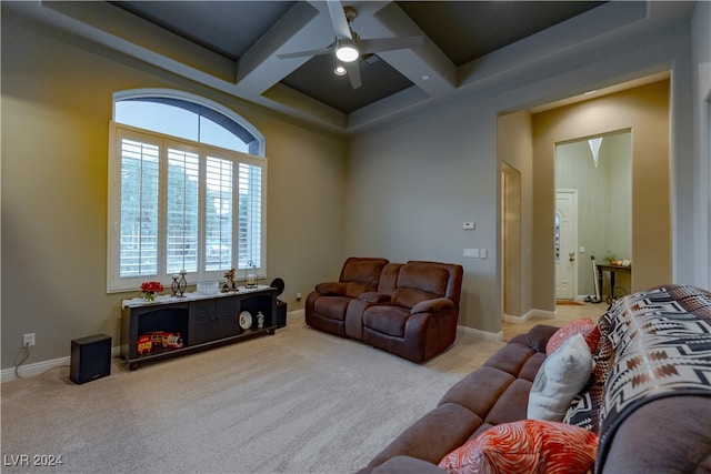 carpeted living room featuring coffered ceiling, beam ceiling, and ceiling fan