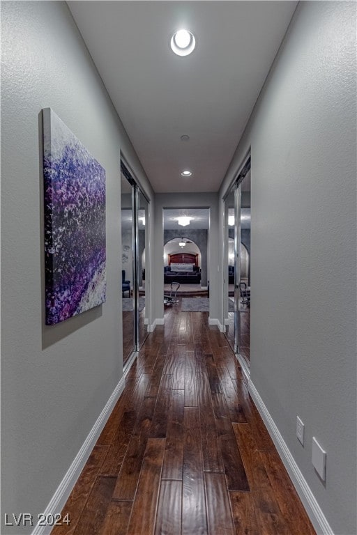 hallway featuring dark hardwood / wood-style floors