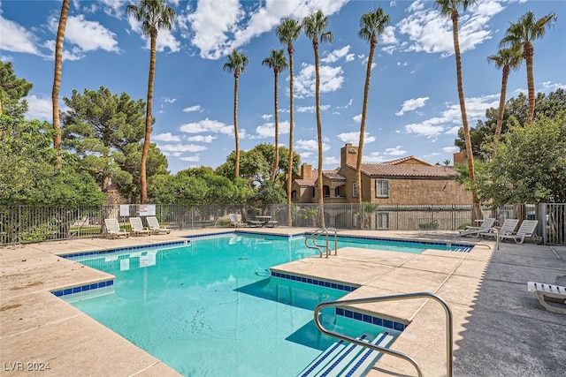 view of pool featuring a patio