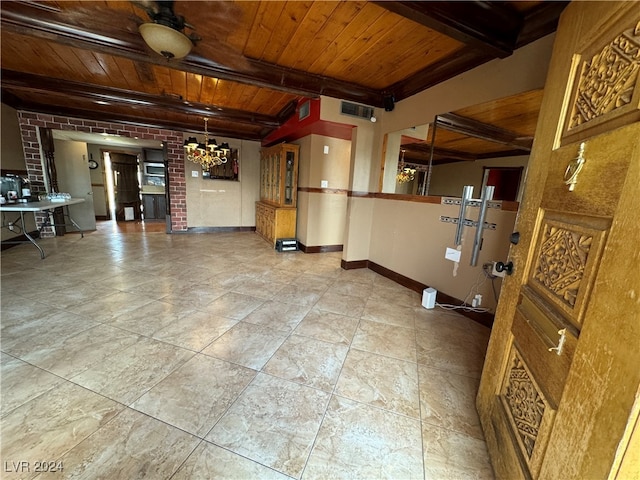 interior space with wood ceiling, beamed ceiling, and a chandelier