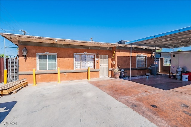 rear view of house with a patio area