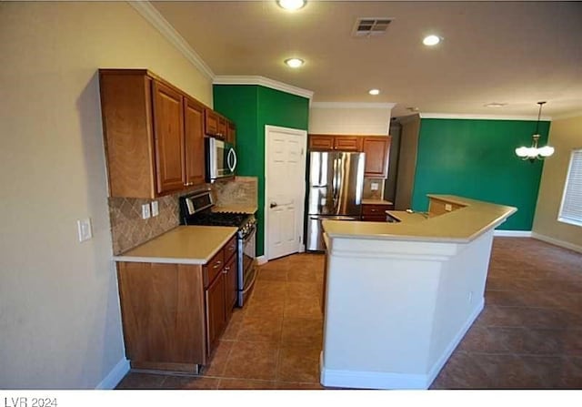 kitchen with a center island, hanging light fixtures, an inviting chandelier, appliances with stainless steel finishes, and ornamental molding