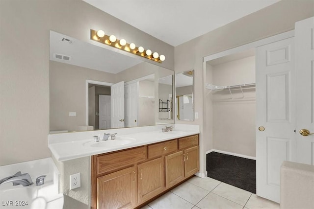 full bathroom featuring tile patterned flooring, visible vents, and a sink