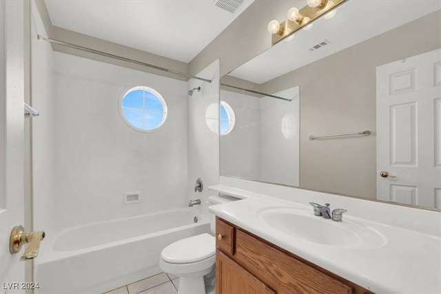 bathroom featuring vanity, visible vents, tile patterned flooring, and shower / tub combination