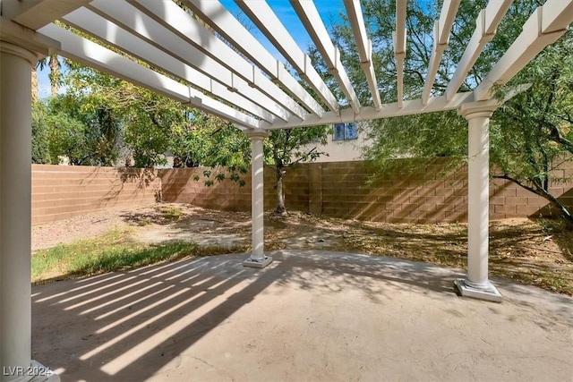 view of patio / terrace featuring a pergola and a fenced backyard