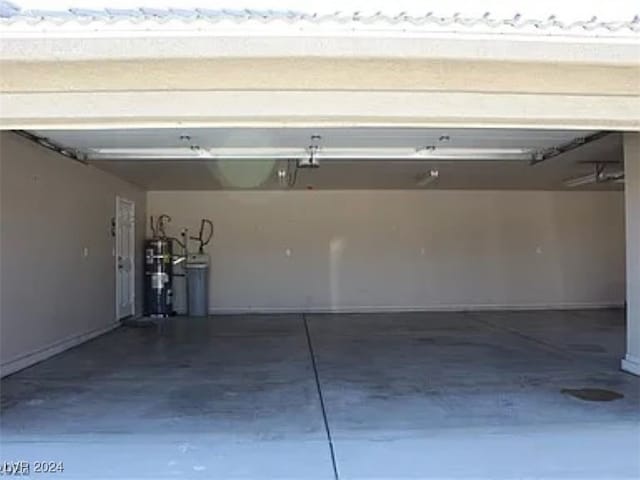 garage featuring strapped water heater