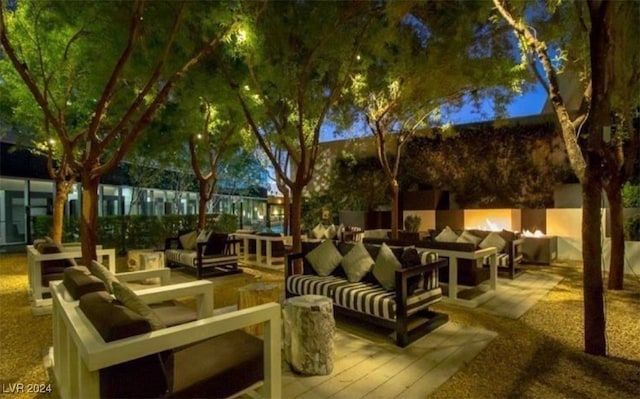 4471 Dean Martin Dr Unit 606, Las Vegas, NV 89103 - wooden terrace featuring an outdoor living space