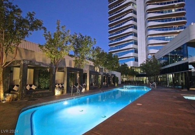 view of pool featuring a patio