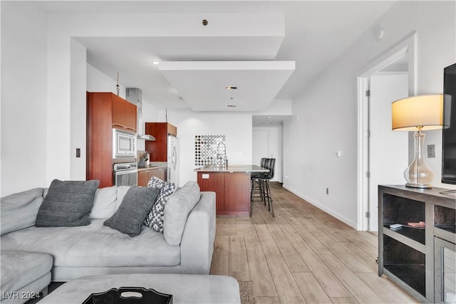 4471 Dean Martin Dr Unit 606, Las Vegas, NV 89103 - living area with light wood-style flooring and baseboards