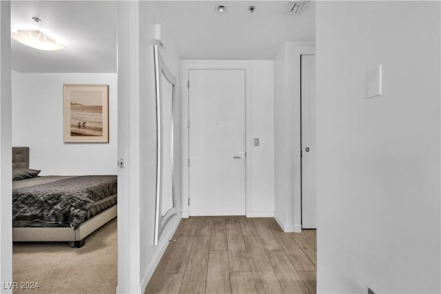 4471 Dean Martin Dr Unit 606, Las Vegas, NV 89103 - hall featuring wood finished floors and baseboards