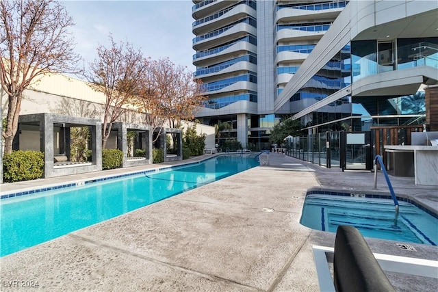 4471 Dean Martin Dr Unit 606, Las Vegas, NV 89103 - community pool featuring a patio area
