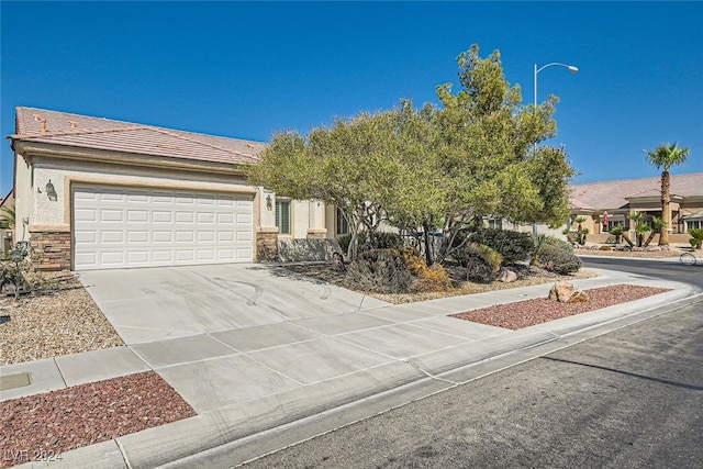 view of front of property featuring a garage