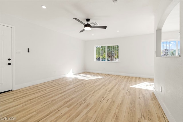 unfurnished room with light hardwood / wood-style floors and ceiling fan