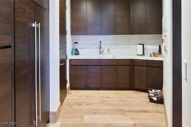 bathroom featuring wood-type flooring and vanity