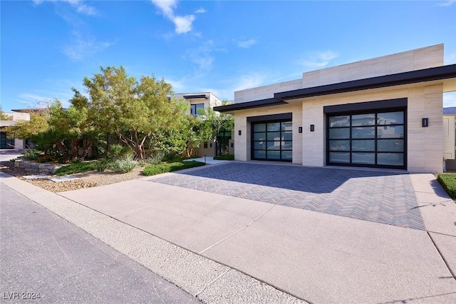 4915 Summit Overlook Dr, Las Vegas, NV 89135 - contemporary house featuring decorative driveway