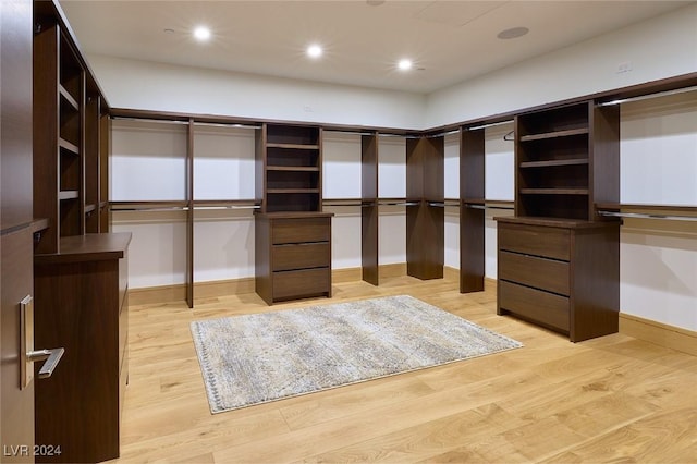 4915 Summit Overlook Dr, Las Vegas, NV 89135 - walk in closet with light wood-style flooring