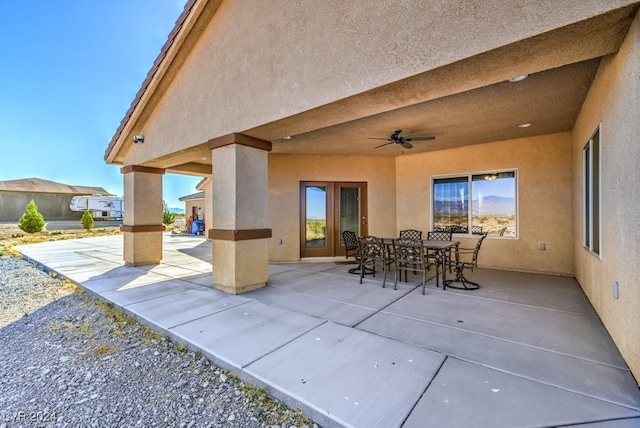 view of patio with ceiling fan