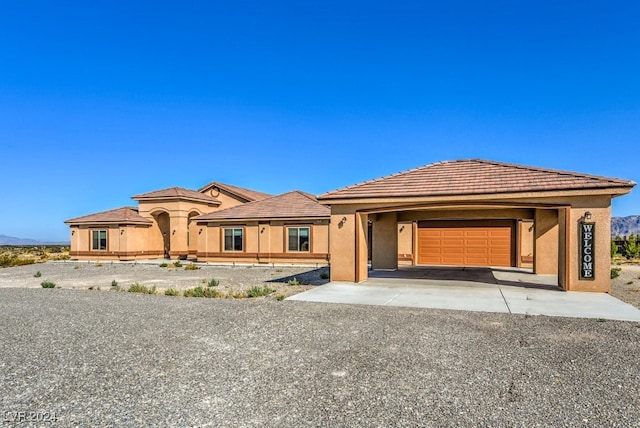 view of front of property with a garage