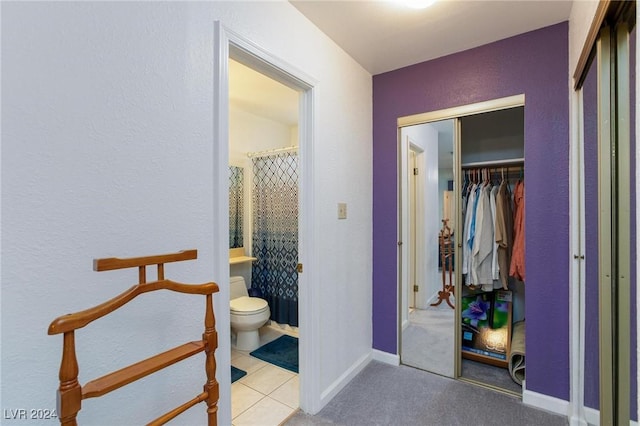 4020 Shadow Wood Ave, Las Vegas, NV 89121 - full bathroom with toilet, tile patterned floors, a textured wall, curtained shower, and baseboards