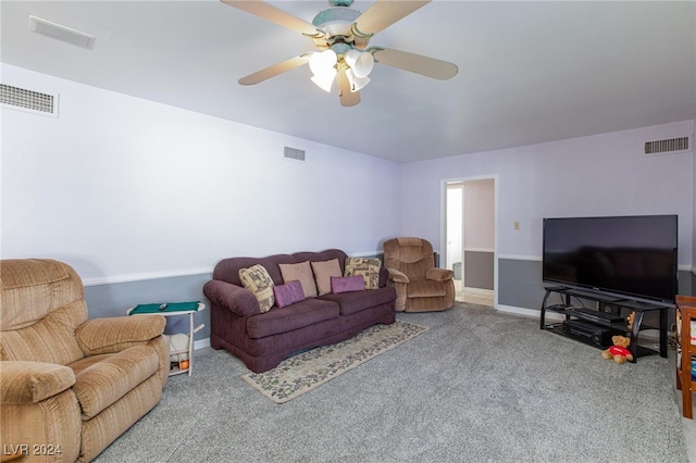 living room with carpet floors and ceiling fan