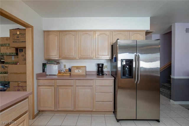 4020 Shadow Wood Ave, Las Vegas, NV 89121 - kitchen featuring stainless steel fridge, light brown cabinetry, and light tile patterned floors