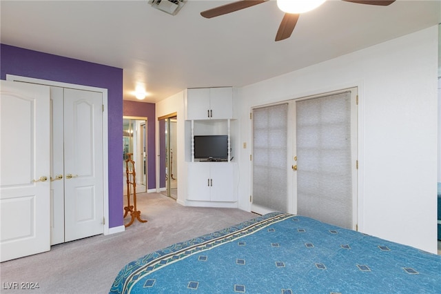 unfurnished bedroom with light carpet and ceiling fan