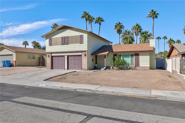 view of front of property with a garage